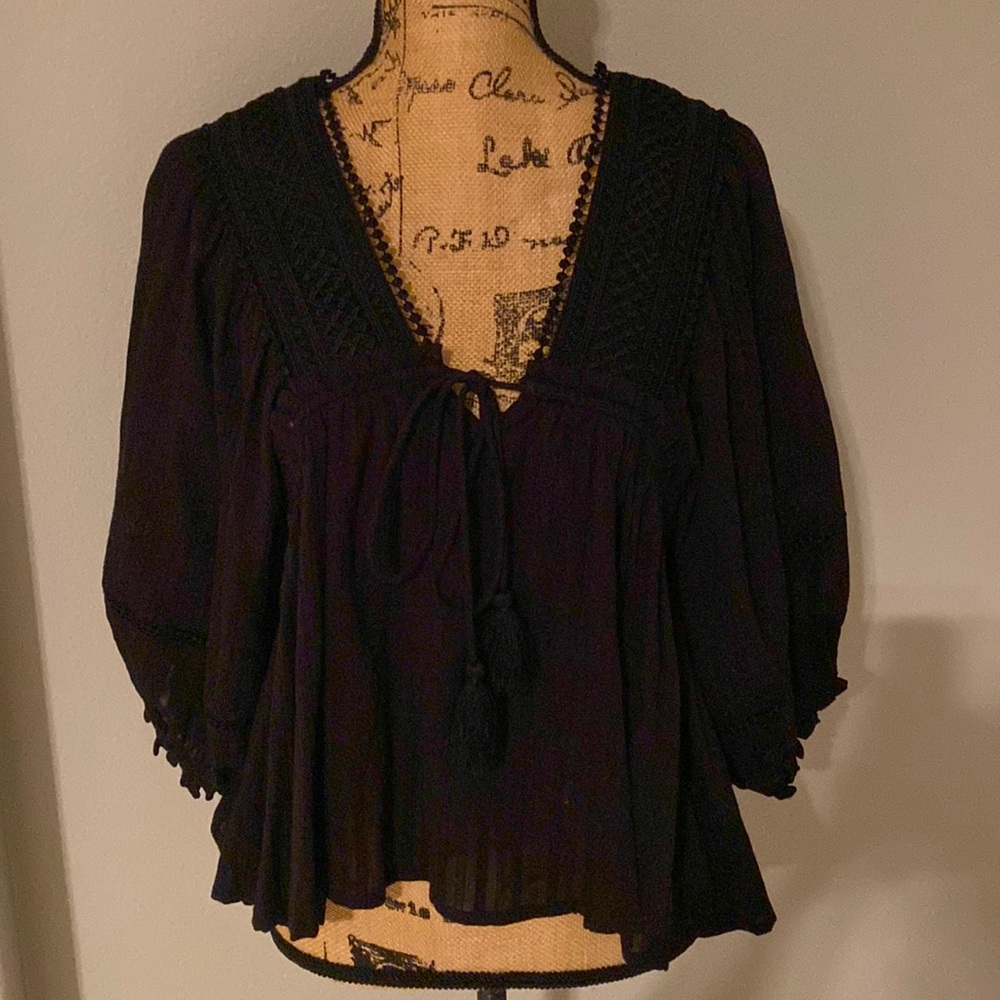 ee:some black babydoll style cotton top.  Wonderful details. Size small. NWT.
